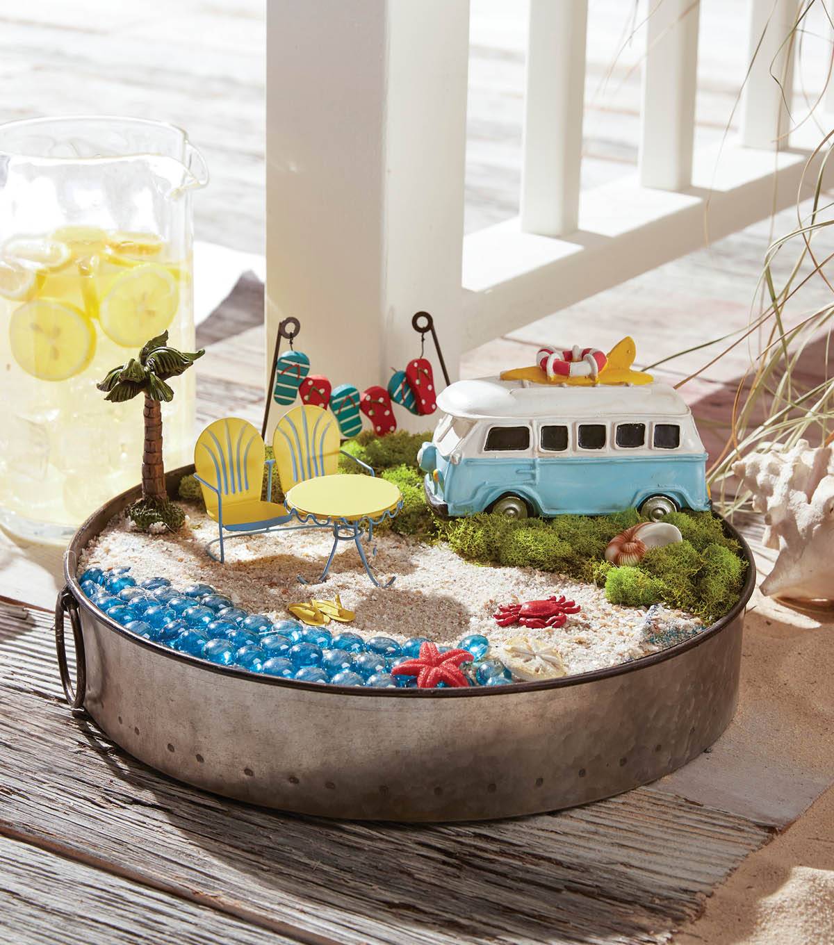 beach fairy garden in a metal cheescake pan with bus