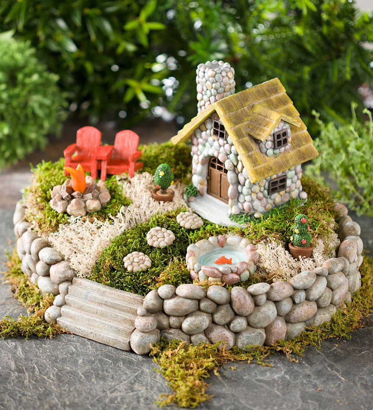 Miniature fairy garden with pebbles