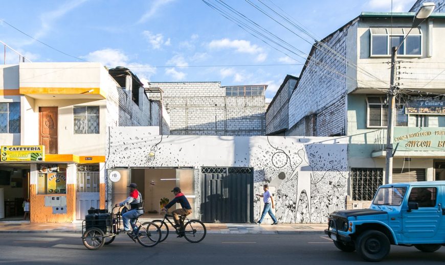 Integrating with the Cityscape: Custom Wall Mural Enlivens Tiny Modern Office