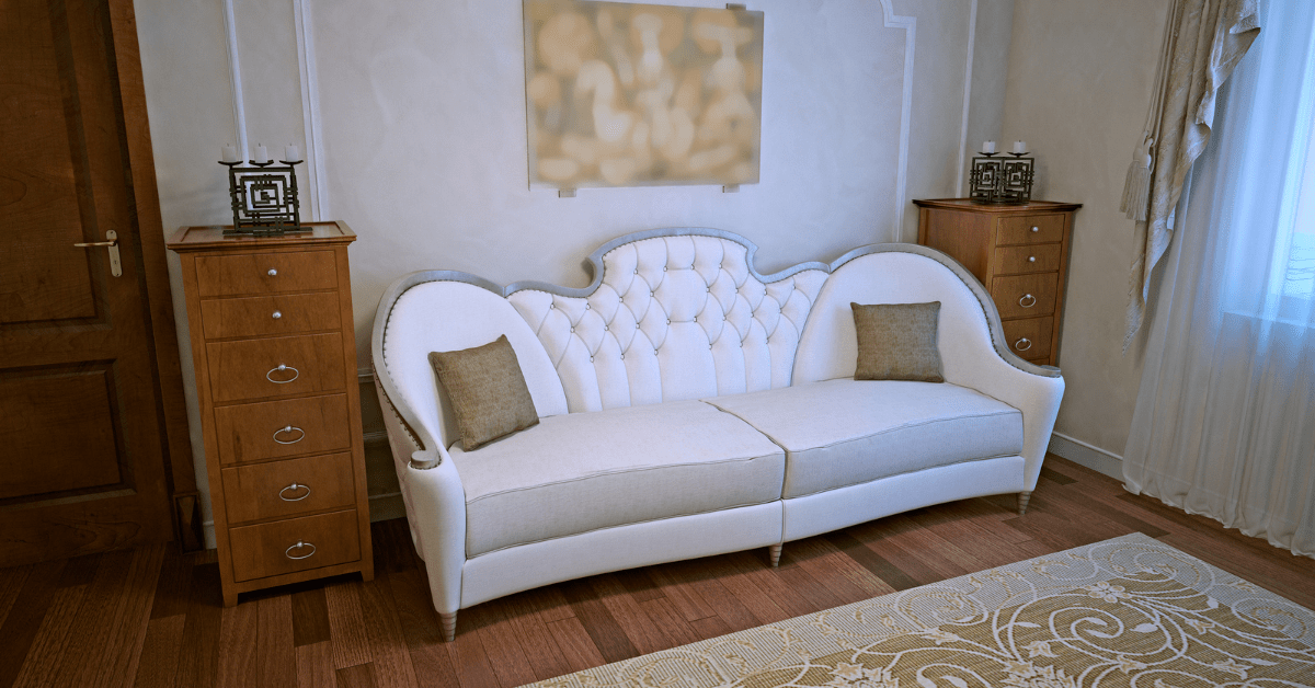 Art deco living room with white couch.